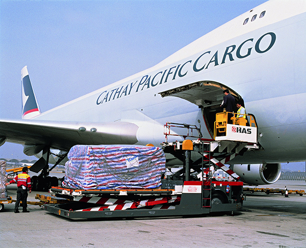 Infant formula, presumably, being loaded aboard a Cathay Pacific air freighter