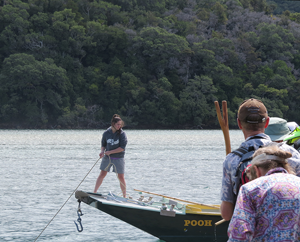 Caitlin Owston Doyle warping the ferry Pooh into position at the Wenderholm Jetty, 2014