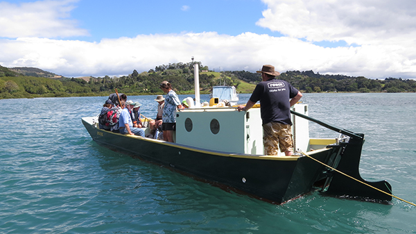 Mike Owston-Doyle helming the Pooh, Pūhoi Estuary, 2014