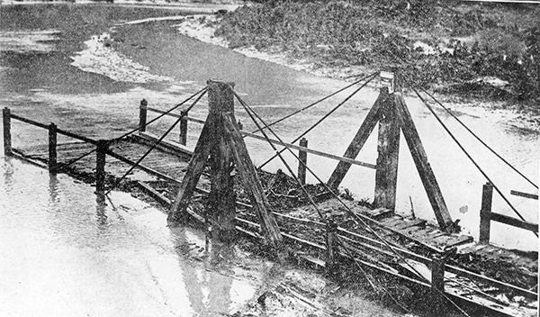 Flood-damaged Pūhoi swing bridge