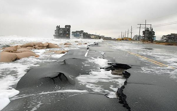 North Carolina road damage, 5-story beachfront house exposed