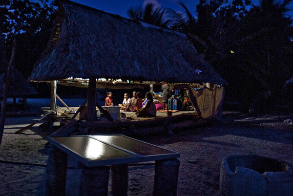 Tarawa family, lit with photovoltaic power