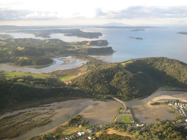 Aerial photograph of-Mahurangi coastline, Waiwera in foreground