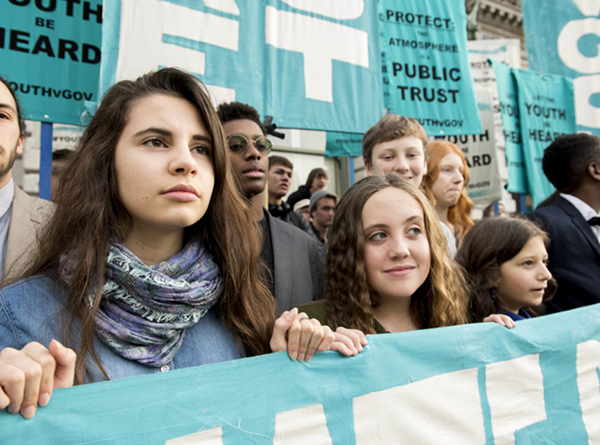 Our Children’s Trust children and banner