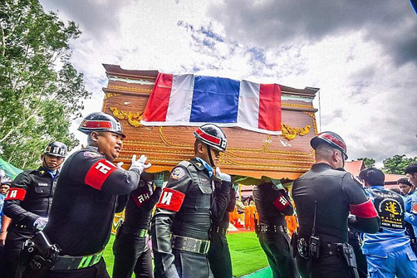 Navy seals bearing the coffin of Saman Kunan