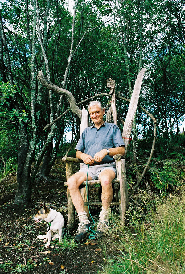 Jaap van Dorsser seated on rustic throne